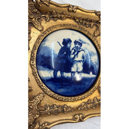 7 - Gilt framed blue and white wall plaque, approximate frame measurements 12 x 12 inches