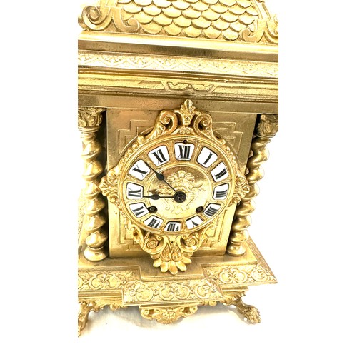 78 - Vintage brass 2 key hole mantel clock with key and pendulum, approximate measurements Height 14 inch... 