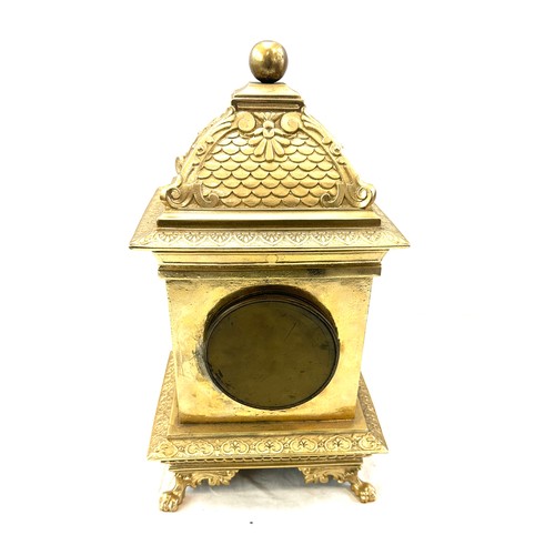 78 - Vintage brass 2 key hole mantel clock with key and pendulum, approximate measurements Height 14 inch... 