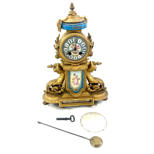 67 - French gilded 2 key hole mantle clock with porcelain plaque, 12 inches wide 16 inches wide with key ... 