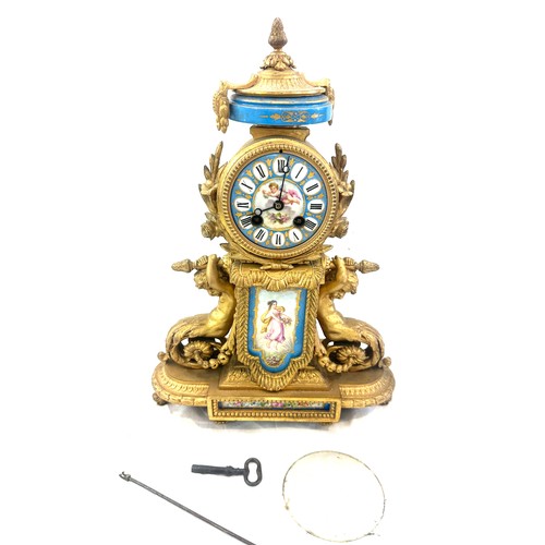 67 - French gilded 2 key hole mantle clock with porcelain plaque, 12 inches wide 16 inches wide with key ... 