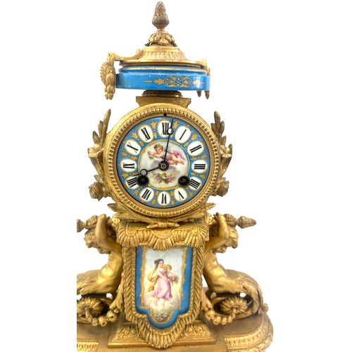 67 - French gilded 2 key hole mantle clock with porcelain plaque, 12 inches wide 16 inches wide with key ... 