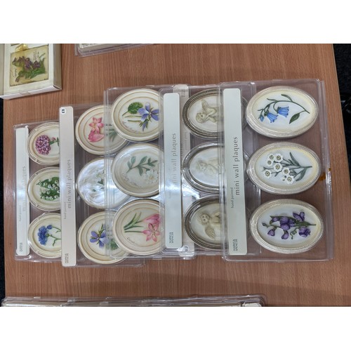 202 - Selection of Marks and Spencer's mini wall plaques, new in boxes