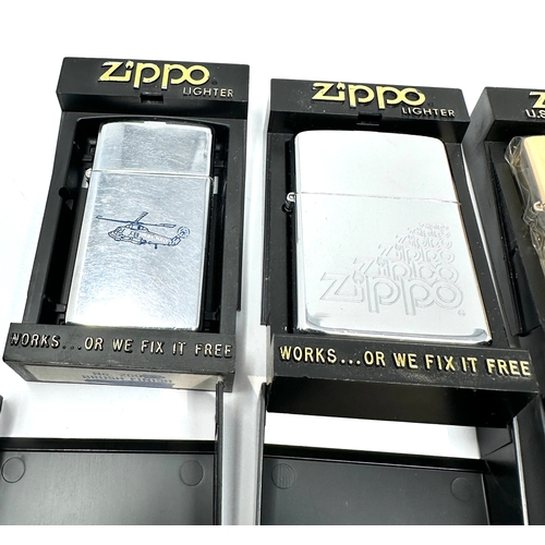 552 - 4 as new Zippo lighters all original boxed