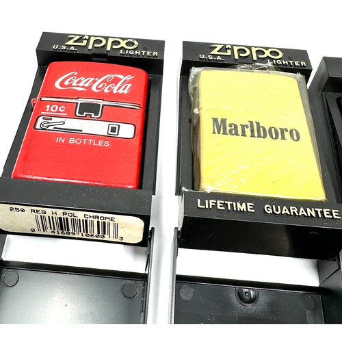 553 - 3 Zippo lighters all original boxed, coca cola lighter is not zippo