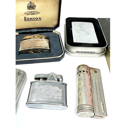 554 - Collection of vintage cigarette lighters includes zippo etc