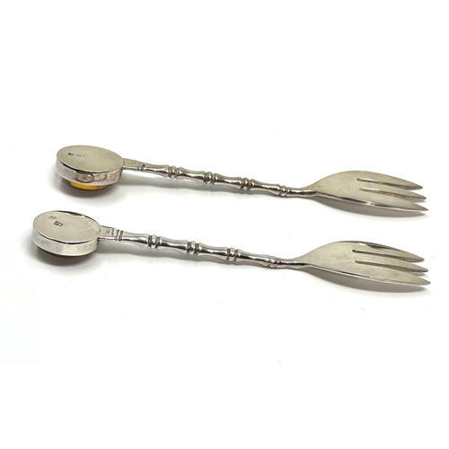 18 - 2 silver & amber pickle forks