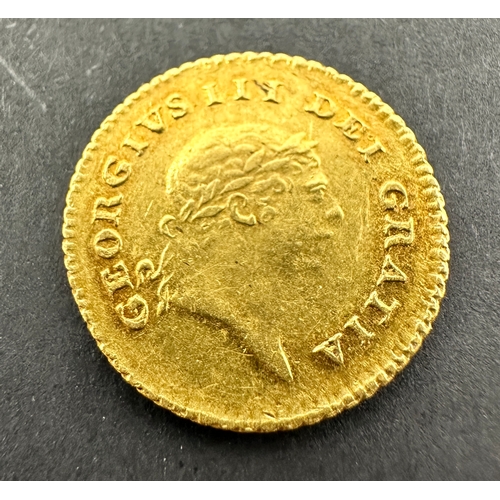 522 - A rare, collectable gold Third-Guinea of King George III, dated 1810. The obverse features the fifth... 