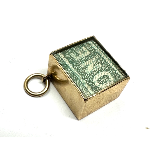 88 - 9ct gold emergency money charm weight 3.3g