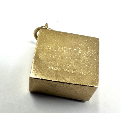 88 - 9ct gold emergency money charm weight 3.3g