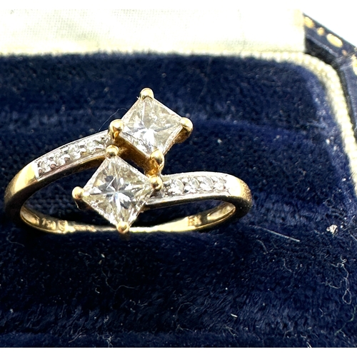 89 - 18ct gold 2 square cut diamond with diamond shoulders est 0.60 pt diamonds weight of ring 2.1g