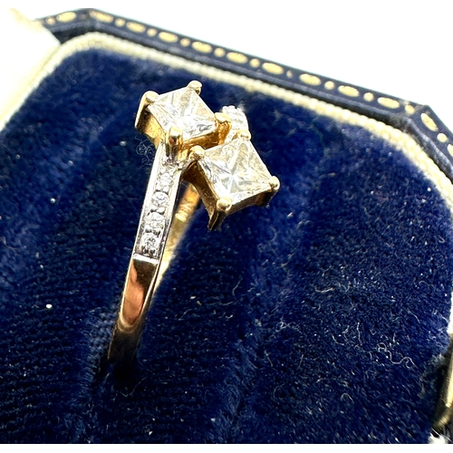 89 - 18ct gold 2 square cut diamond with diamond shoulders est 0.60 pt diamonds weight of ring 2.1g