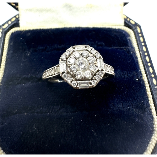 111 - 18ct white gold diamond cluster ring with diamond shoulders weight 2.7g est .50ct diamonds