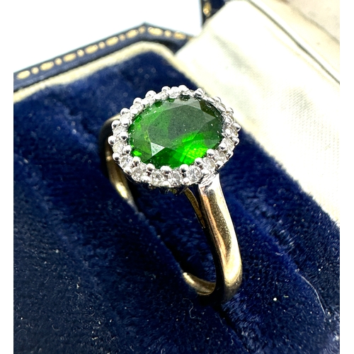 124 - 9ct gold diopside & diamond ring weight 2.2g