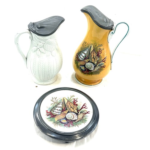 348 - 2 Vintage porcelain and metal water jugs