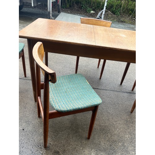 413 - Teak mid century extending table and four chairs