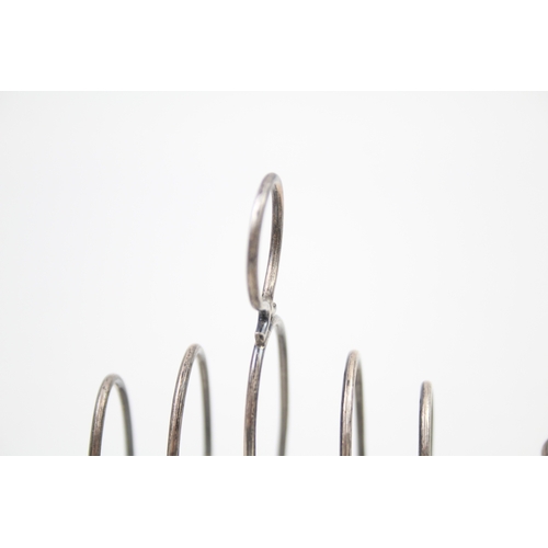 35 - 3 x .925 sterling toast rack & pepperettes