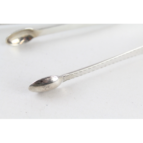 61 - 2 x .925 sterling georgian sugar tongs