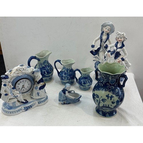 381 - Selection of blue and white pottery includes figures, jugs etc