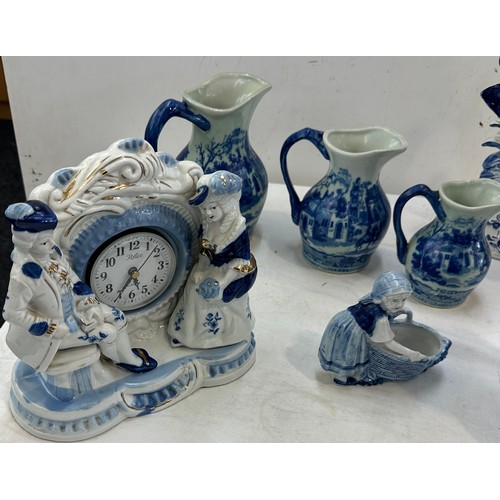 381 - Selection of blue and white pottery includes figures, jugs etc