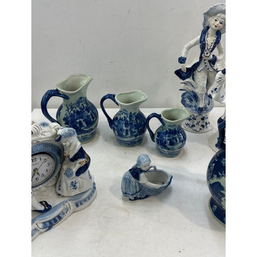 381 - Selection of blue and white pottery includes figures, jugs etc