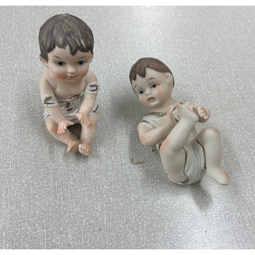 376 - Large selection of assorted Baby figures includes Piano babies etc