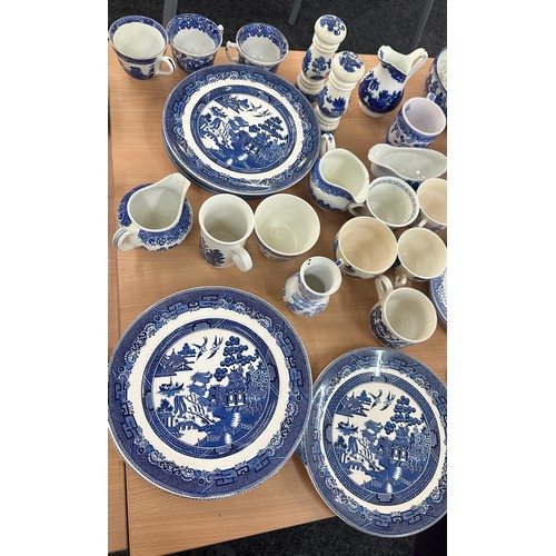 386 - Large selection of blue and white pottery to include plates, vases etc