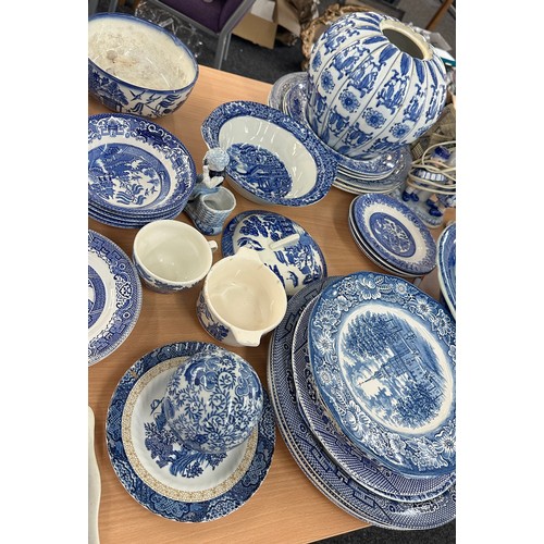 386 - Large selection of blue and white pottery to include plates, vases etc