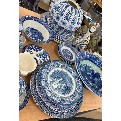 386 - Large selection of blue and white pottery to include plates, vases etc