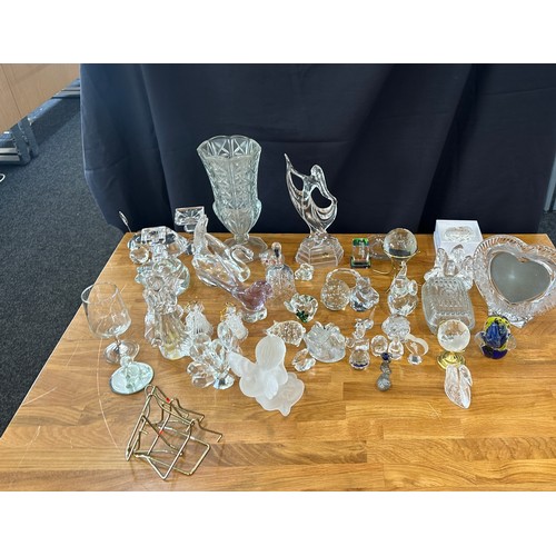 394 - Large selection of assorted glassware includes figures, photo frames etc