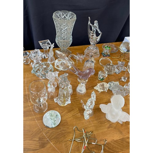 394 - Large selection of assorted glassware includes figures, photo frames etc