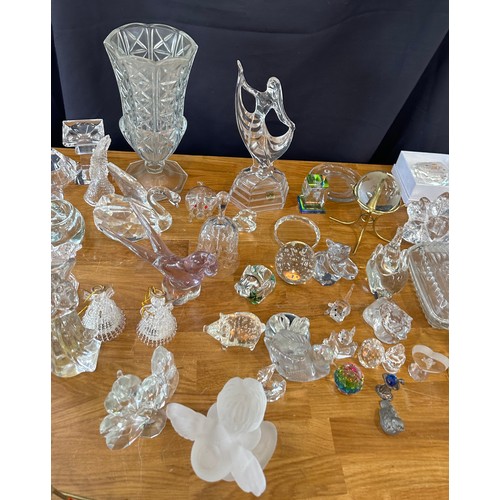 394 - Large selection of assorted glassware includes figures, photo frames etc