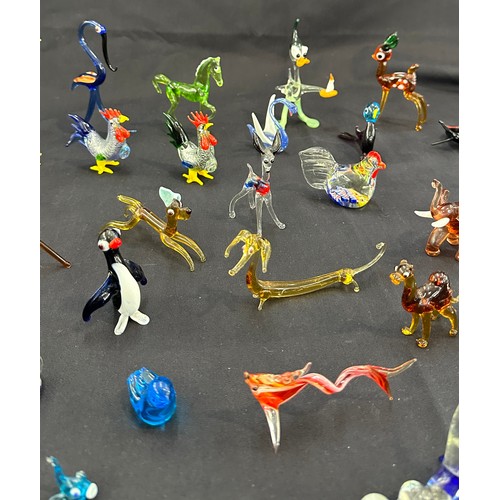 579 - Large selection of coloured glass animals