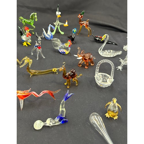 579 - Large selection of coloured glass animals