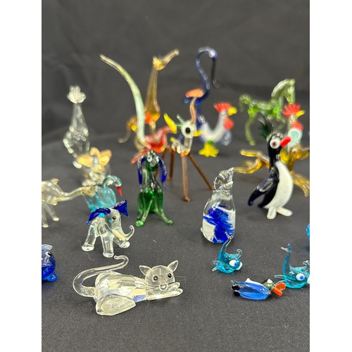 579 - Large selection of coloured glass animals