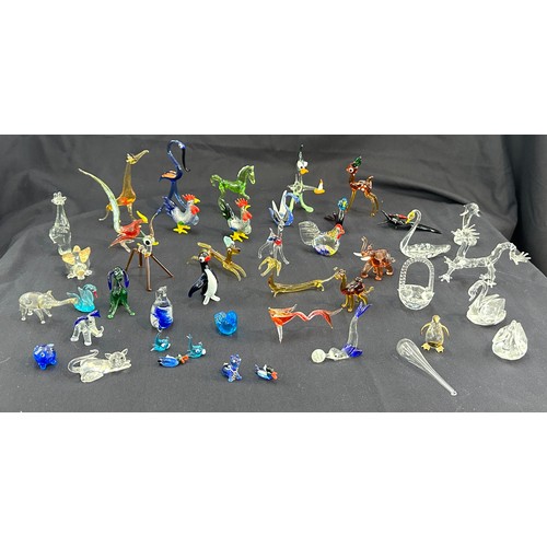 579 - Large selection of coloured glass animals