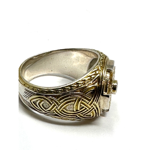 331 - silver Bishop's ring celtic design set with emerald weight 16g