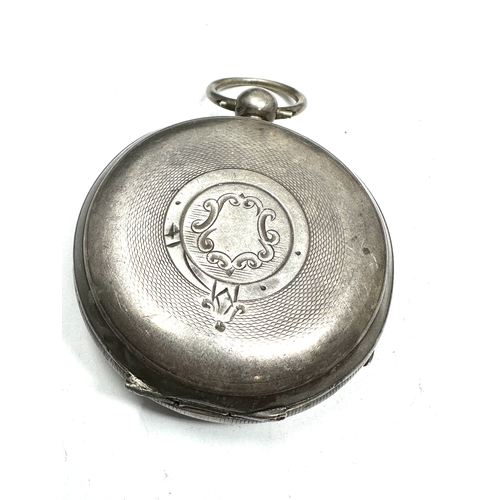 346 - Antique silver open face pocket watch  the watch is ticking missing hands