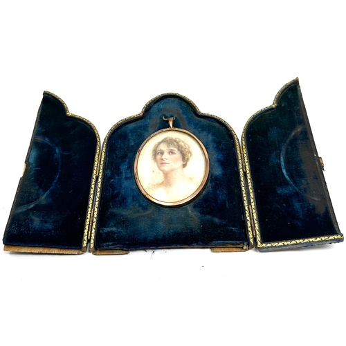 556 - Antique leather easel framed miniature painting  painting measures approx 8cm drop by 6cm wide in a ... 