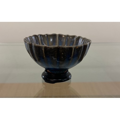 563 - Oriental glazed bowl on stand - no marks to base - measures approx 3 inches tall ( on stand ) and 4 ... 