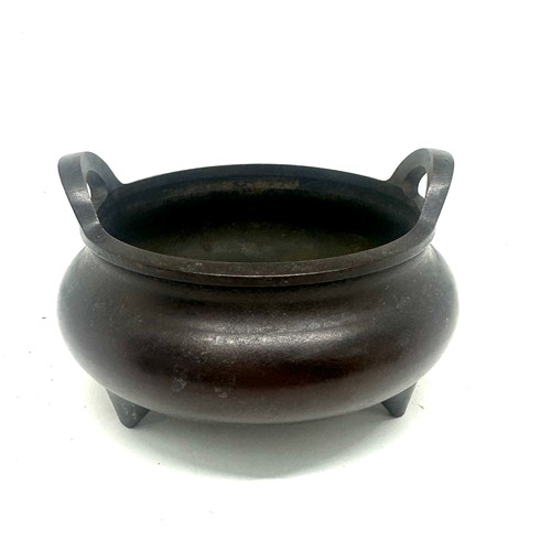 540 - 3 Legged metal 2 handled censor Chinese bowl, marks to base 4 inches tall 5 inches diameter