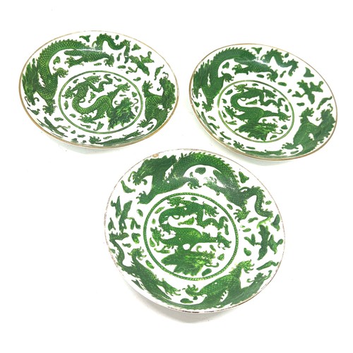 542 - Three chinese oriental green and white dragon design plates 6 inches diameter