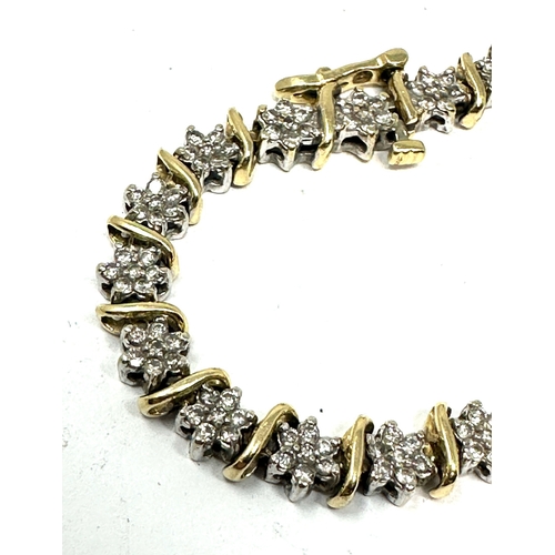 128 - 9ct gold diamond tennis bracelet weight 13.5g