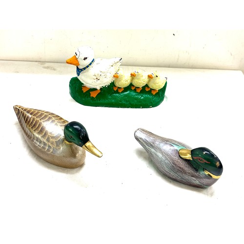 67 - 2 Painted cast iron ducks, 1 cast iron duck and ducking door stop