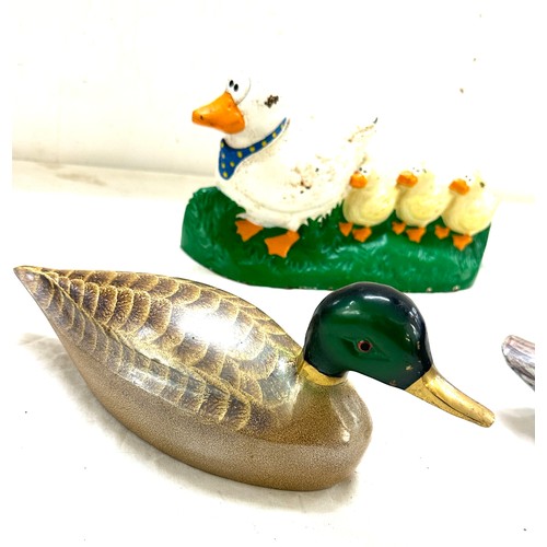 67 - 2 Painted cast iron ducks, 1 cast iron duck and ducking door stop