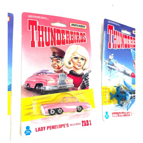 95 - 2 x Thunderbirds 1 pilot Scott Tracy in original packaging, Lady Penelope's car in original packagin... 