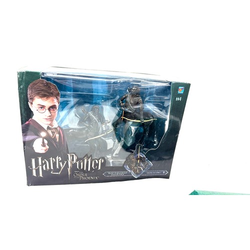 83 - Harry Potter and the order of Phoenix magical creatures, Sirius black, both in original packaging