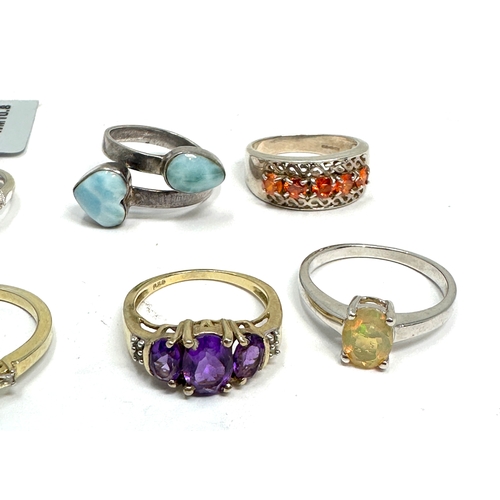 273 - Selection of 8 silver gemstone set rings