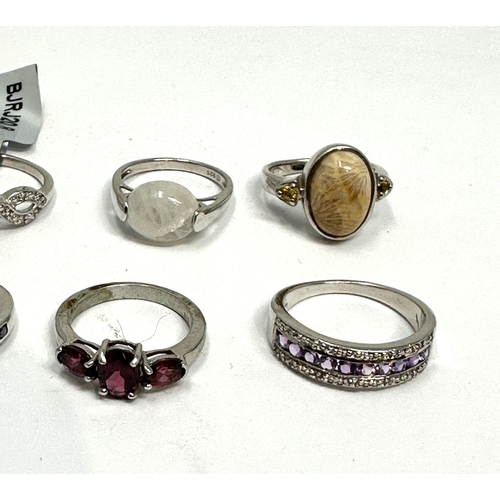 274 - Selection of 8 silver gemstone set rings