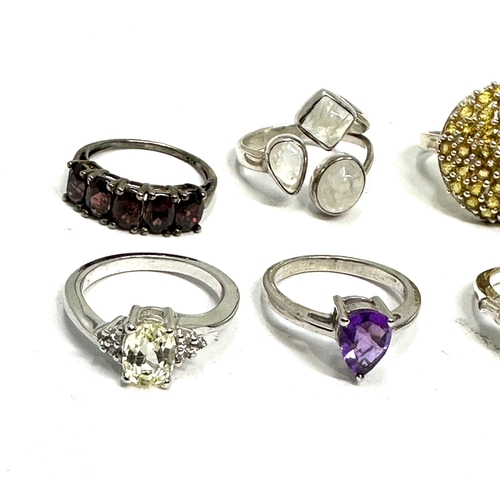 275 - Selection of silver 8 gemstone set rings